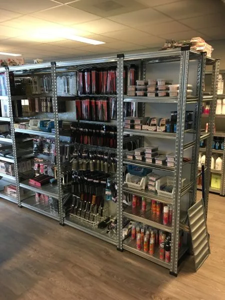 Perfo borden magazijnstellingen.nl hangende producten Xafi Kappers Appingedam